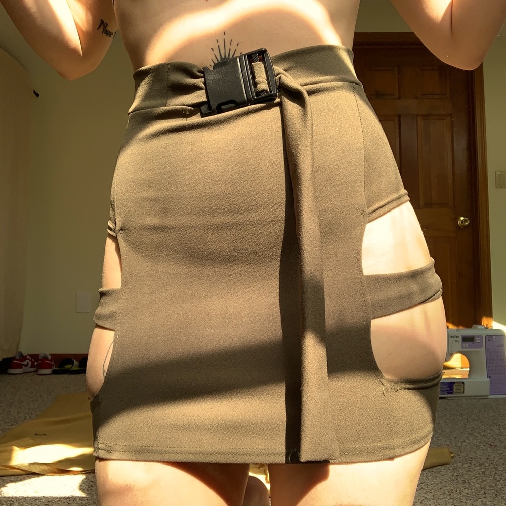 Buckle waist, hip cut out mini skirt